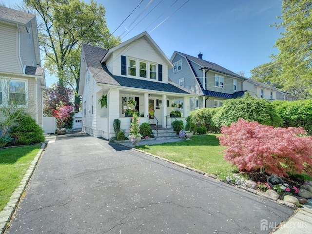 939 Salem Rd, Union Twp, NJ 07083 - view of front of property with a front yard, a porch, and roof with shingles