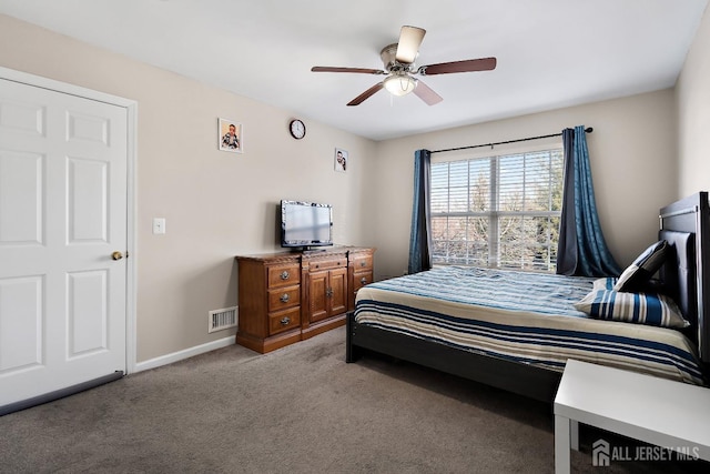 carpeted bedroom with ceiling fan