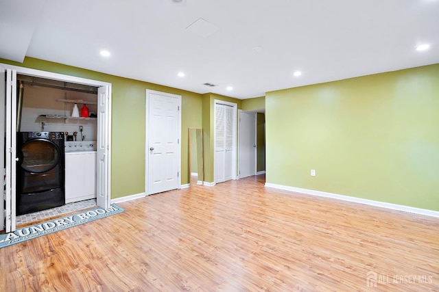 interior space featuring light hardwood / wood-style floors and washer and dryer