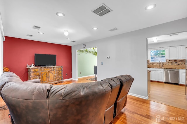 30 Montague Ave, Woodbridge Proper, NJ 08830 - living area featuring recessed lighting and light wood-style floors