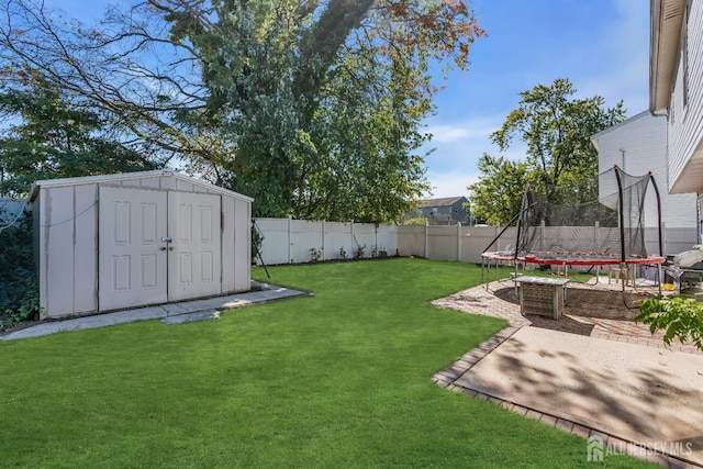 30 Montague Ave, Woodbridge Proper, NJ 08830 - fenced backyard with a trampoline, a storage shed, and a patio