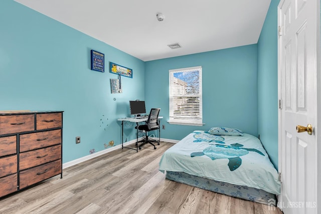 30 Montague Ave, Woodbridge Proper, NJ 08830 - bedroom featuring wood finished floors and a desk