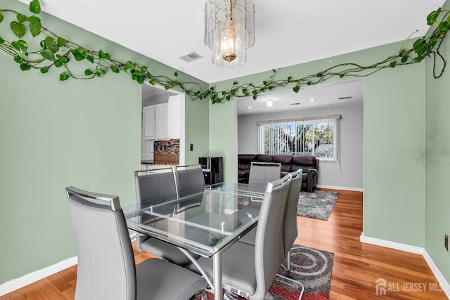 30 Montague Ave, Woodbridge Proper, NJ 08830 - dining area featuring baseboards and light wood-style flooring