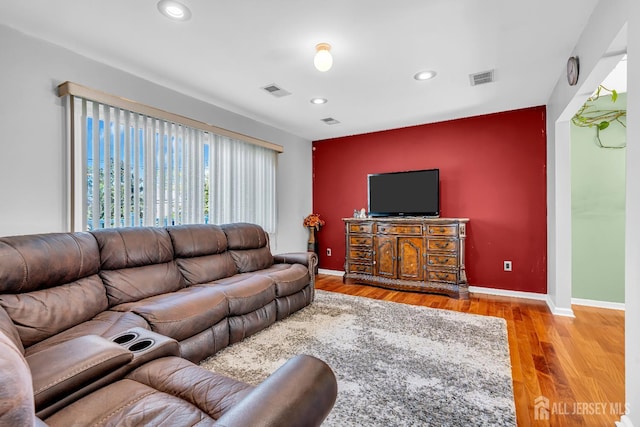 30 Montague Ave, Woodbridge Proper, NJ 08830 - living area with recessed lighting, an accent wall, and wood finished floors