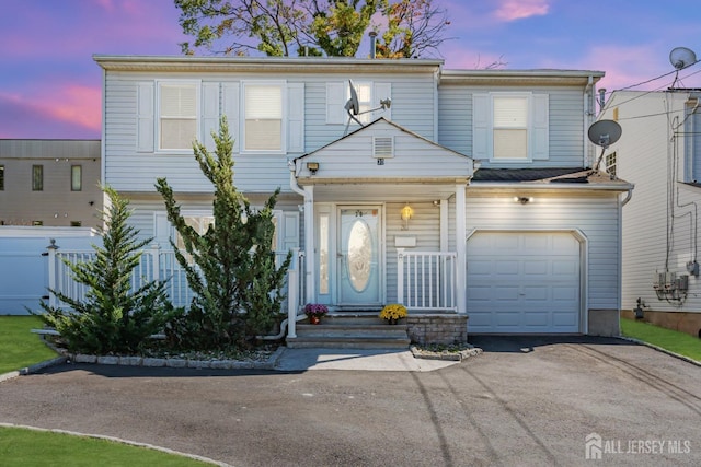 30 Montague Ave, Woodbridge Proper, NJ 08830 - traditional-style home featuring asphalt driveway and a garage