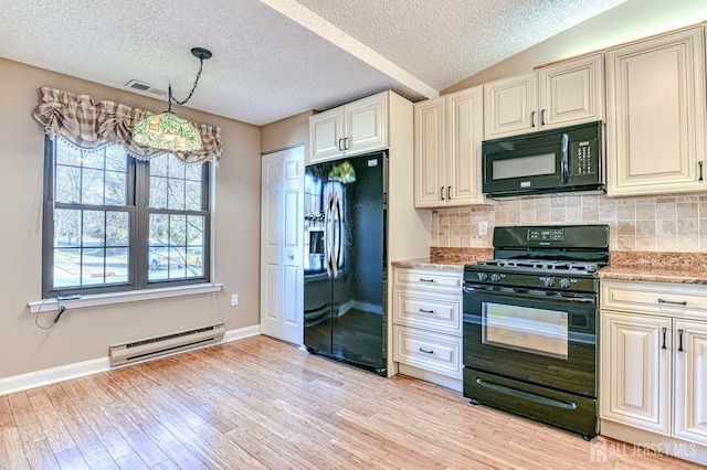 kitchen with backsplash, lofted ceiling, light wood-style flooring, black appliances, and a baseboard radiator