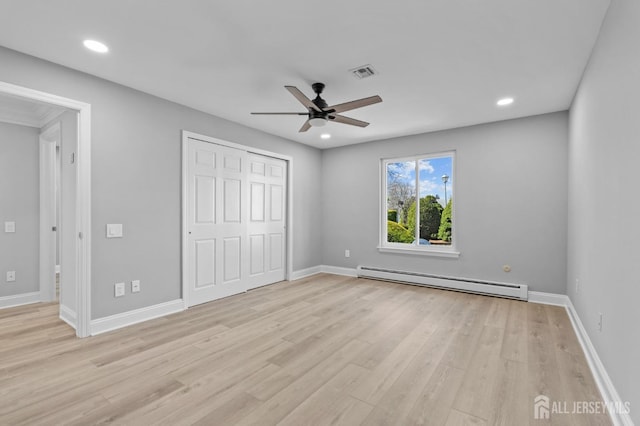 91 Dogwood Plz Unit A, Monroe, NJ 08831 - unfurnished bedroom with a baseboard radiator, light wood-type flooring, baseboards, and recessed lighting