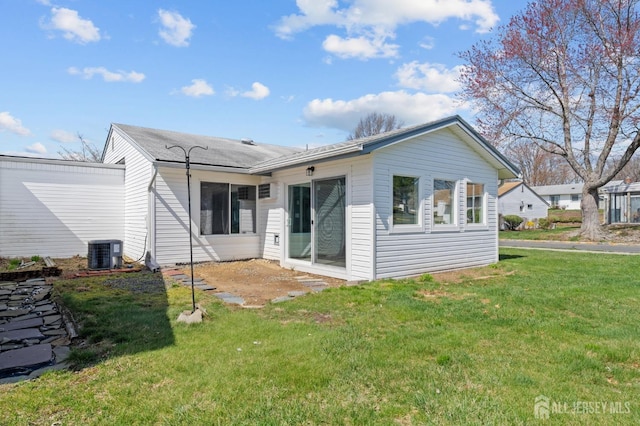 91 Dogwood Plz Unit A, Monroe, NJ 08831 - back of property featuring central AC unit and a lawn