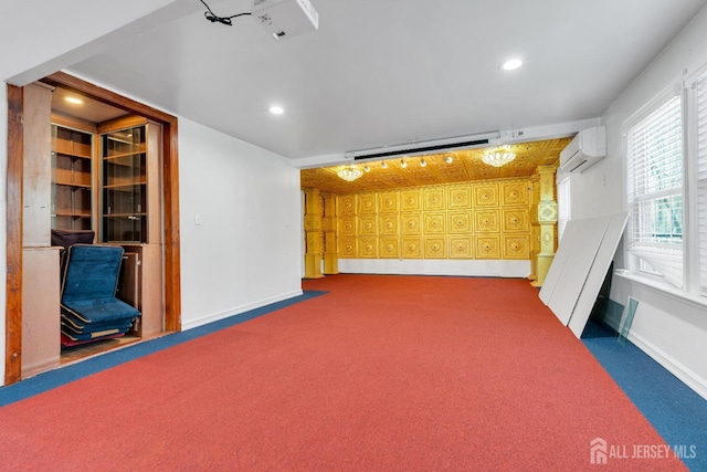 interior space with recessed lighting, baseboards, an AC wall unit, and carpet flooring