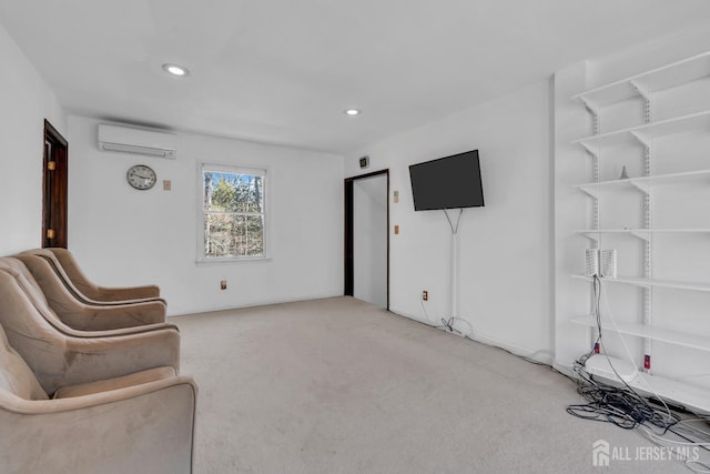 unfurnished room featuring recessed lighting, light colored carpet, and a wall unit AC