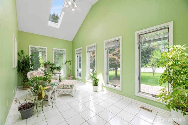 18 Stout Dr, Hillsborough, NJ 08844 - sunroom / solarium with high vaulted ceiling, a skylight, and tile patterned flooring