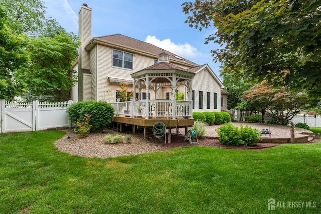 18 Stout Dr, Hillsborough, NJ 08844 - rear view of property with a gazebo, a chimney, a wooden deck, and a patio area