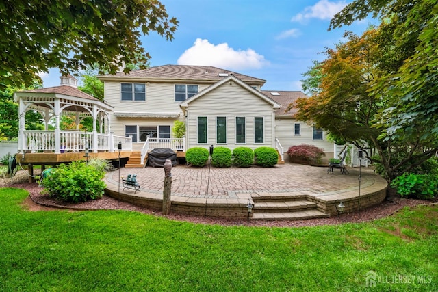 18 Stout Dr, Hillsborough, NJ 08844 - back of property featuring a gazebo, a patio area, a yard, and a deck