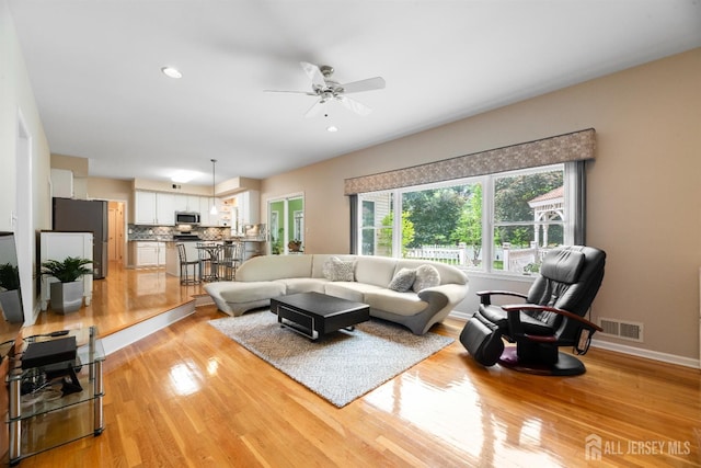18 Stout Dr, Hillsborough, NJ 08844 - living room featuring light wood-style flooring, ceiling fan, and recessed lighting