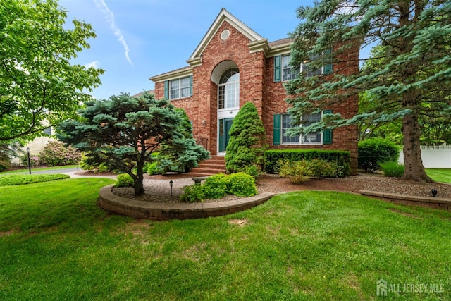 18 Stout Dr, Hillsborough, NJ 08844 - view of front of home featuring a front lawn and brick siding