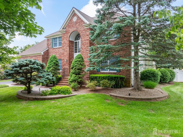 18 Stout Dr, Hillsborough, NJ 08844 - view of front facade with brick siding and roof with shingles