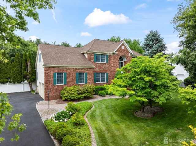 18 Stout Dr, Hillsborough, NJ 08844 - view of front of property featuring brick siding, driveway, roof with shingles, and a garage