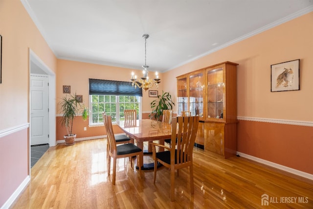 18 Stout Dr, Hillsborough, NJ 08844 - dining room with a chandelier, light wood finished floors, and crown molding
