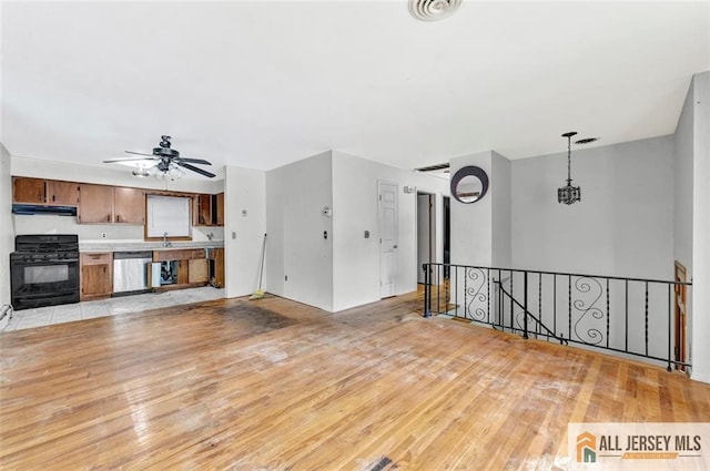 91 Amherst Ave, Colonia, NJ 07067 - unfurnished living room featuring light wood-style flooring and ceiling fan