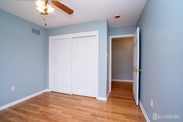 24 Chesapeake Rd, South Brunswick, NJ 08852 - unfurnished bedroom with light wood-style floors, a closet, and a ceiling fan