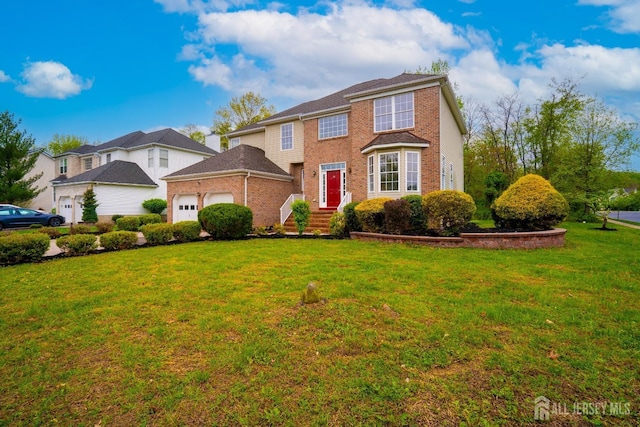 24 Chesapeake Rd, South Brunswick, NJ 08852 - view of front of property featuring a front lawn, brick siding, and a garage