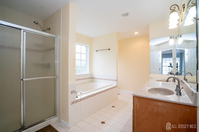 24 Chesapeake Rd, South Brunswick, NJ 08852 - bathroom with a sink, tile patterned floors, a stall shower, double vanity, and a bath