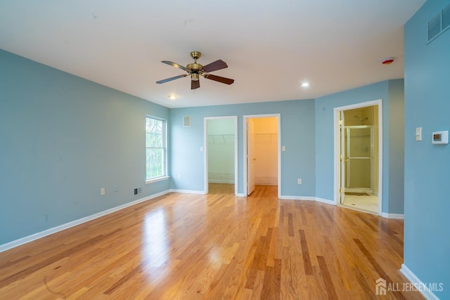 24 Chesapeake Rd, South Brunswick, NJ 08852 - unfurnished bedroom with visible vents, baseboards, light wood-style floors, a spacious closet, and recessed lighting