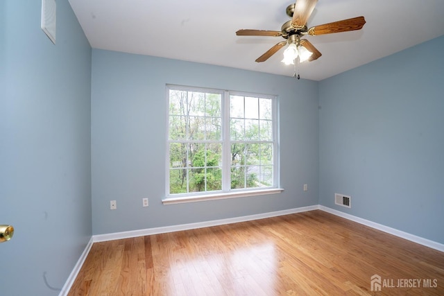 24 Chesapeake Rd, South Brunswick, NJ 08852 - unfurnished room with ceiling fan, baseboards, visible vents, and wood finished floors