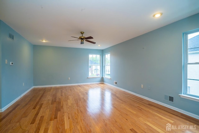 24 Chesapeake Rd, South Brunswick, NJ 08852 - empty room featuring a ceiling fan, baseboards, visible vents, and wood finished floors