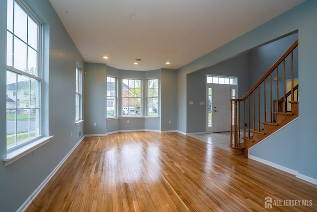 24 Chesapeake Rd, South Brunswick, NJ 08852 - interior space with a wealth of natural light, baseboards, and wood-type flooring