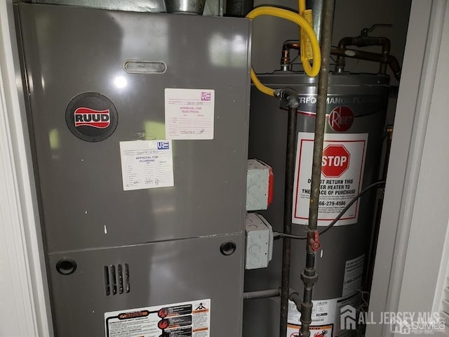 utilities featuring gas water heater and heating unit