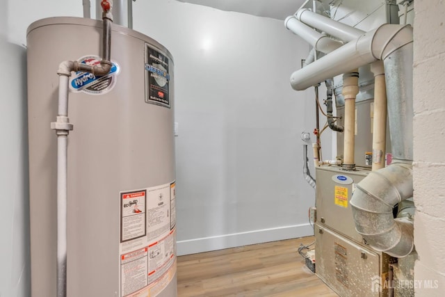 utilities featuring water heater and heating unit