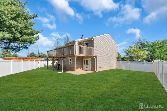 back of property with stairs, a wooden deck, and a patio