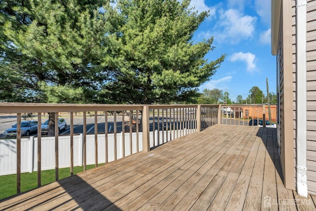 wooden deck featuring fence