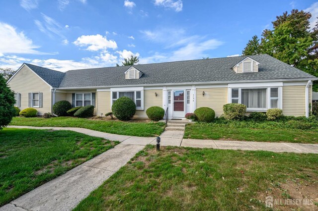 view of front of house with a front lawn