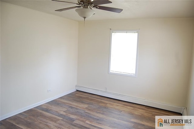 empty room with wood finished floors, a ceiling fan, baseboards, and a baseboard heating unit