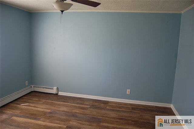 unfurnished room with ceiling fan, a textured ceiling, baseboards, wood finished floors, and ornamental molding