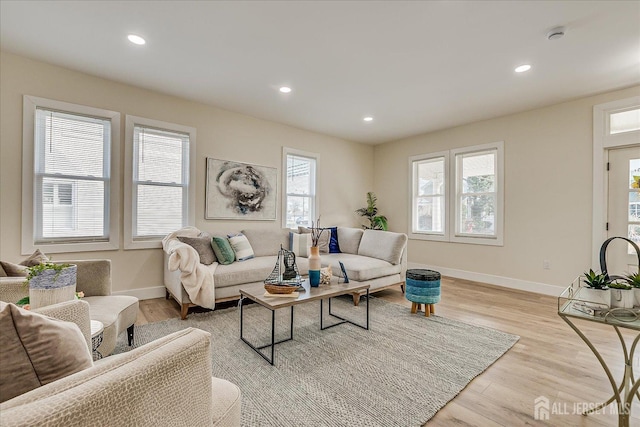 living room with light hardwood / wood-style floors