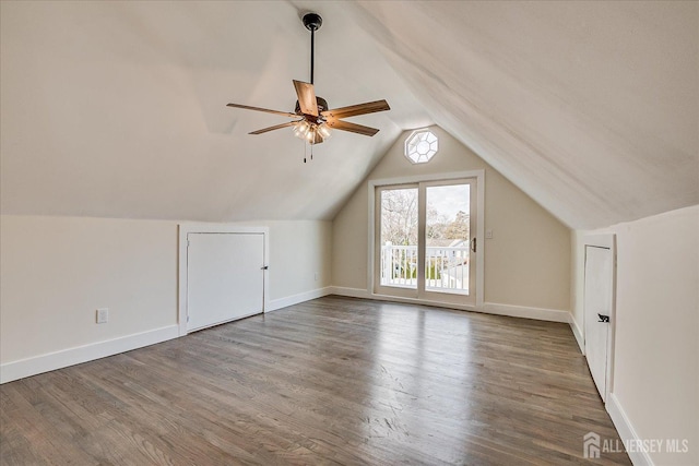 additional living space featuring ceiling fan, hardwood / wood-style floors, and lofted ceiling