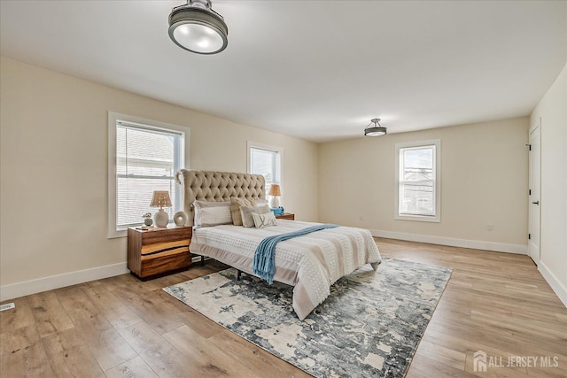 bedroom featuring light hardwood / wood-style floors