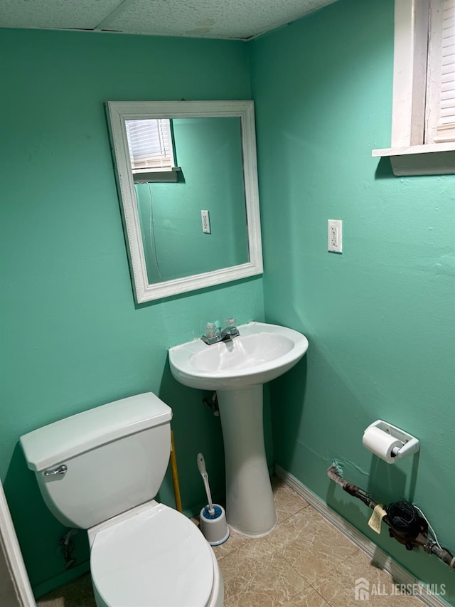 bathroom featuring toilet