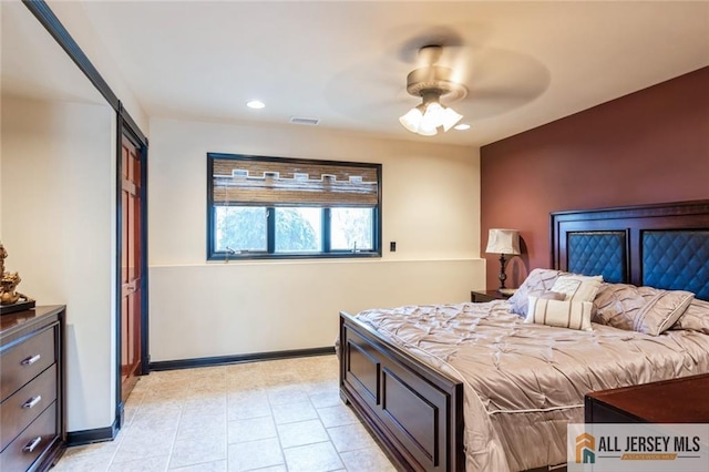 bedroom featuring baseboards, recessed lighting, light tile patterned floors, a ceiling fan, and visible vents