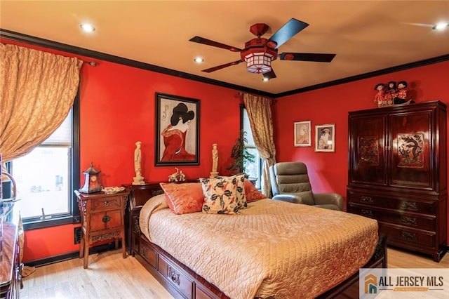 bedroom featuring recessed lighting, light wood-style flooring, ornamental molding, and a ceiling fan