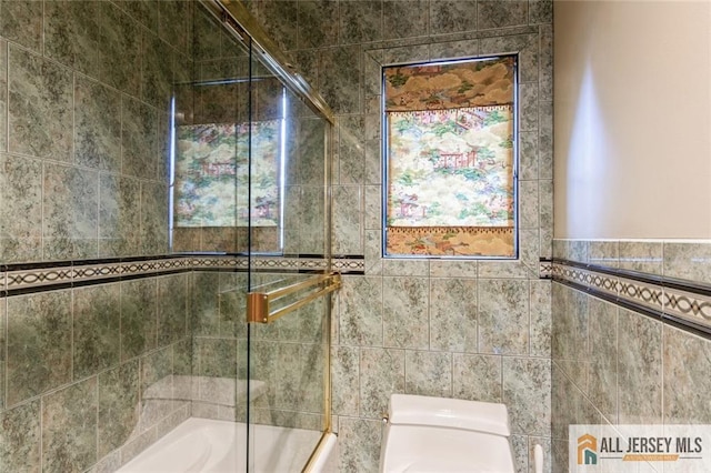 full bathroom with combined bath / shower with glass door
