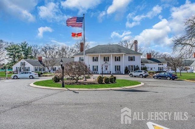 view of greek revival inspired property