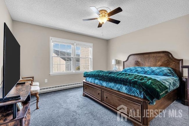 175 Portland Ln Unit C, Monroe, NJ 08831 - bedroom featuring a baseboard radiator, carpet, a textured ceiling, and ceiling fan