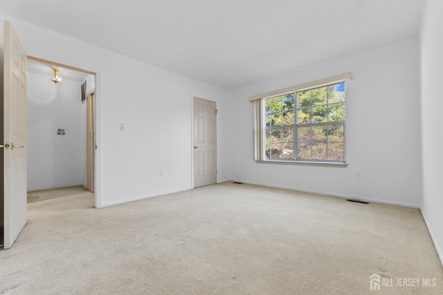 unfurnished bedroom with light carpet