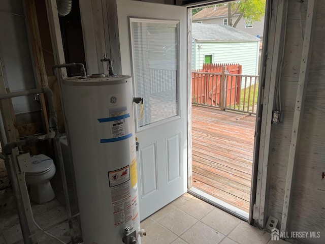 utility room with water heater