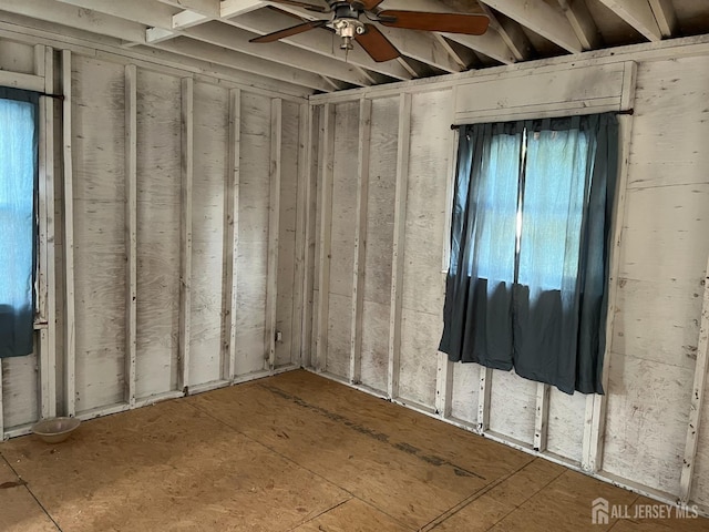 interior space featuring ceiling fan