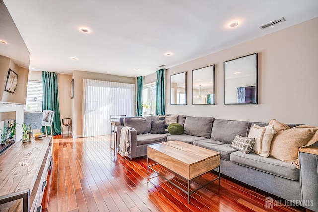 living room with dark hardwood / wood-style floors